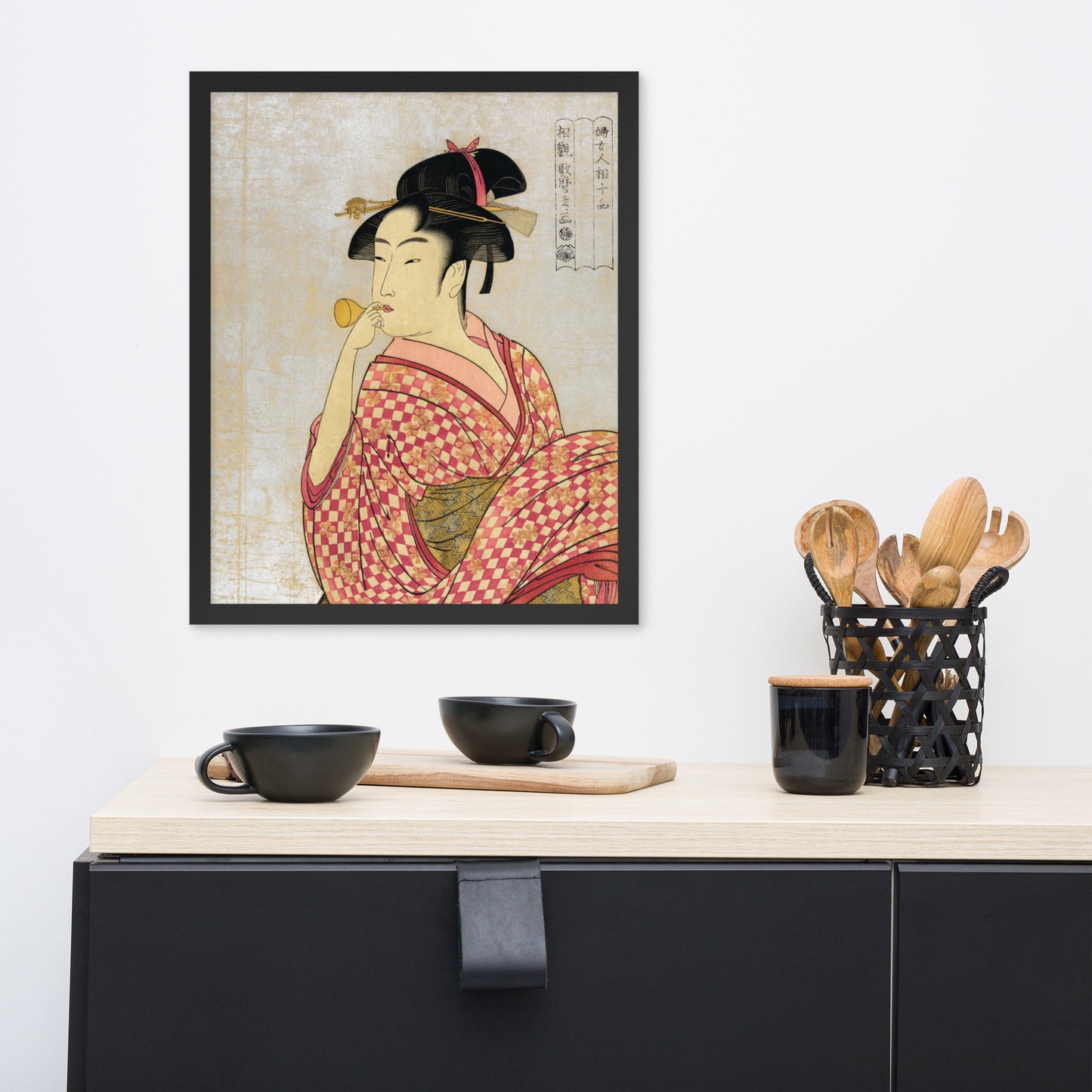 Young Lady Blowing on a Poppin by Kitagawa Utamaro