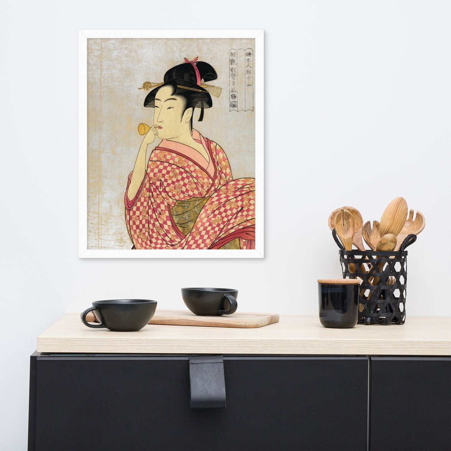 Young Lady Blowing on a Poppin by Kitagawa Utamaro