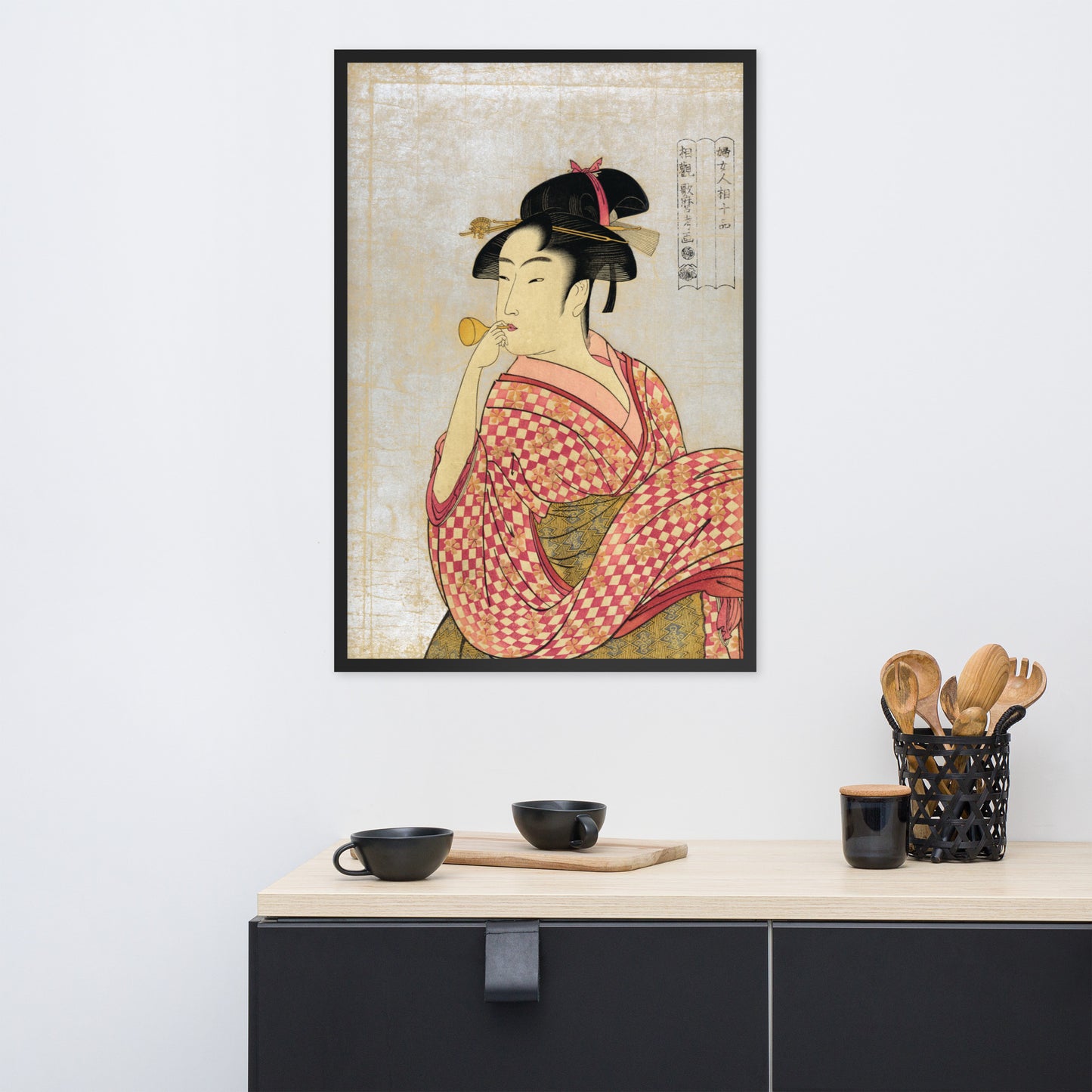 Young Lady Blowing on a Poppin by Kitagawa Utamaro