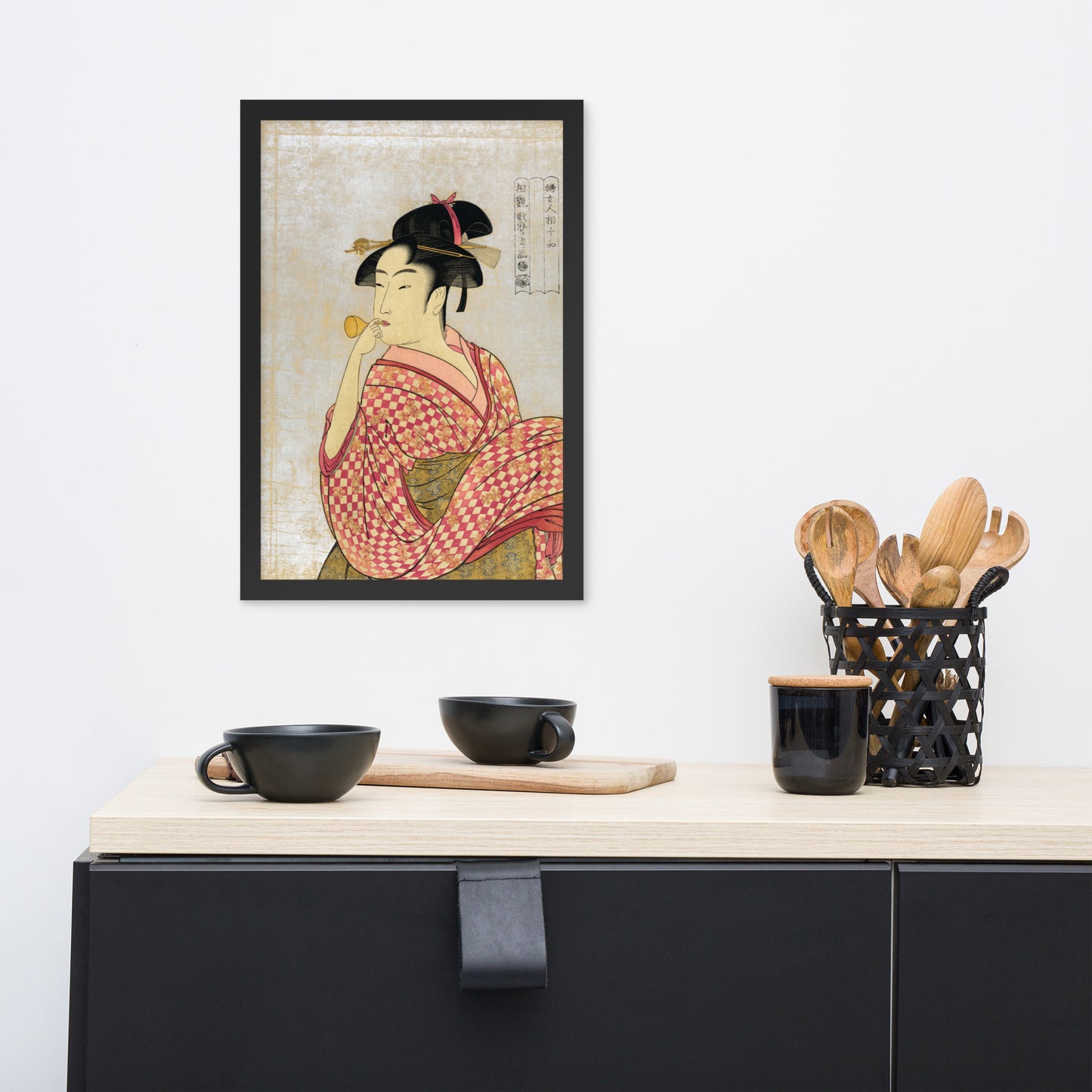 Young Lady Blowing on a Poppin by Kitagawa Utamaro