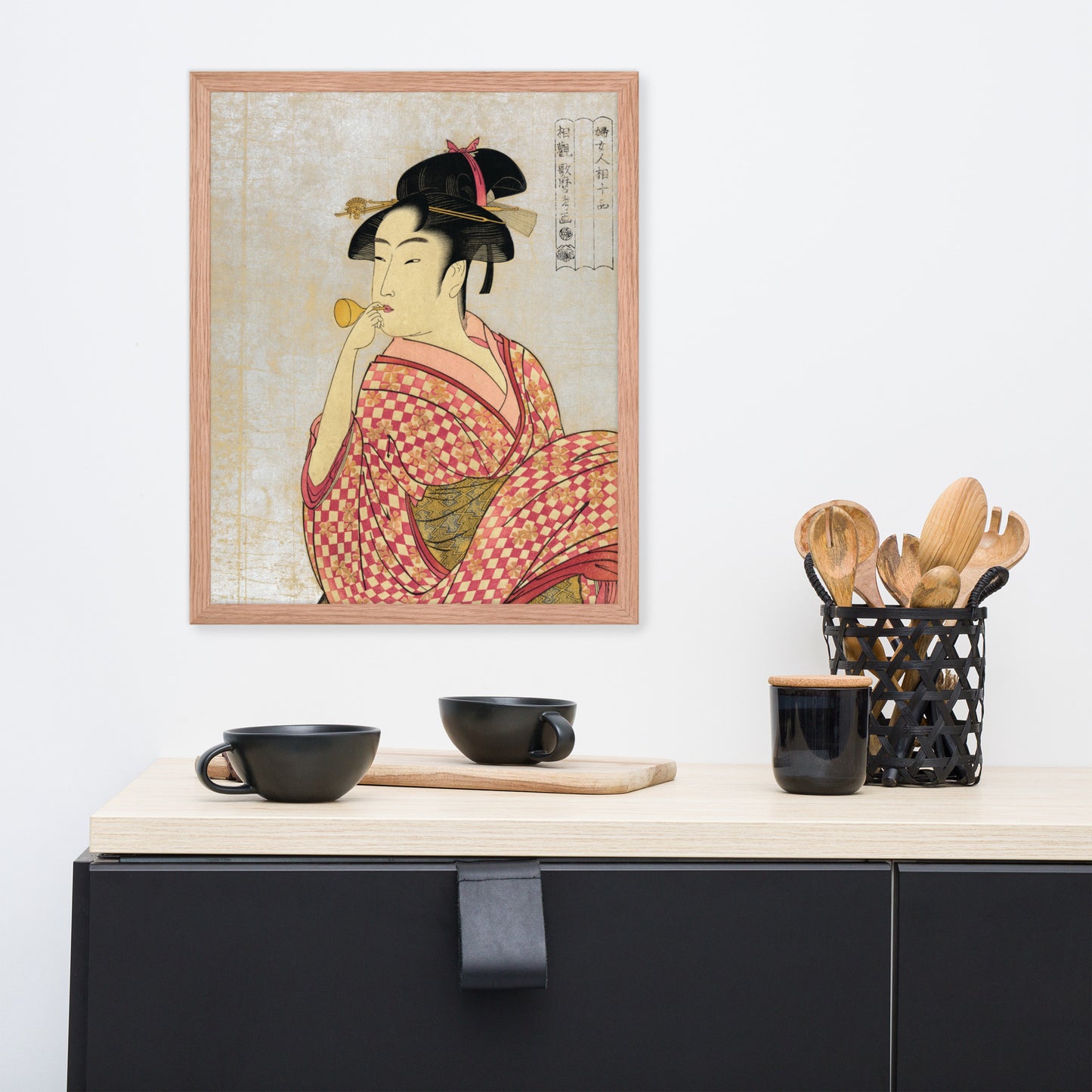 Young Lady Blowing on a Poppin by Kitagawa Utamaro