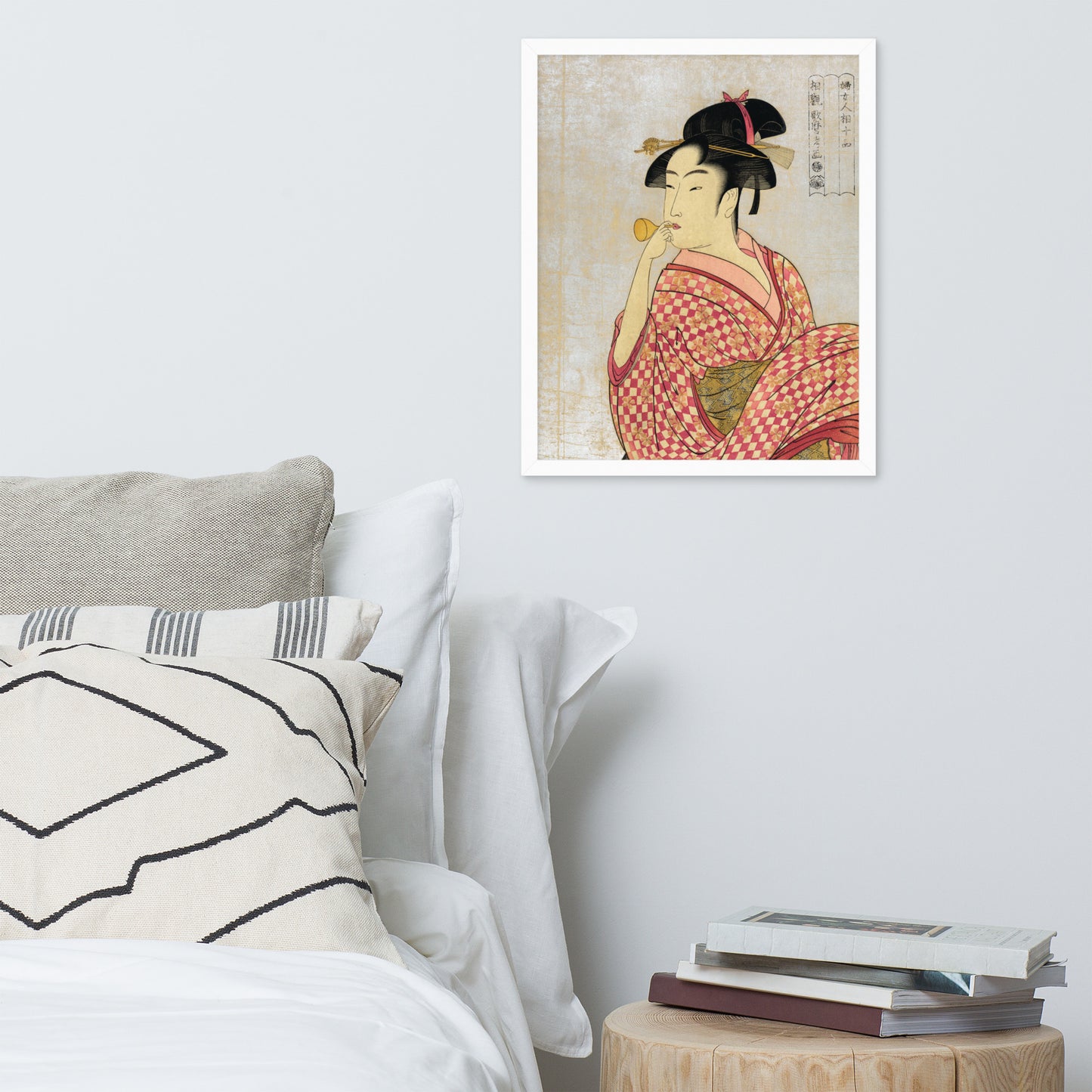 Young Lady Blowing on a Poppin by Kitagawa Utamaro