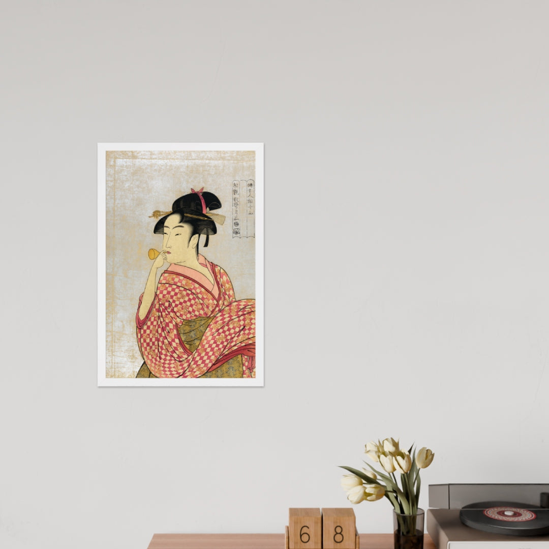 Young Lady Blowing on a Poppin by Kitagawa Utamaro
