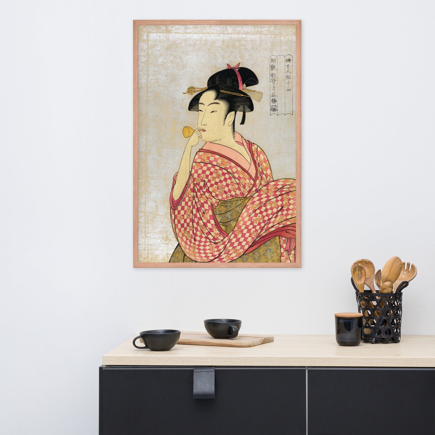 Young Lady Blowing on a Poppin by Kitagawa Utamaro